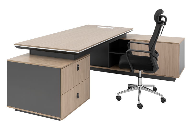 A spacious executive desk with a large work surface, integrated cable management, and concealed storage cabinets, set in a modern corporate office environment.